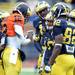 Michigan quarterback Devin Gardner reads off a play during a huddle at spring practice at Michigan Stadium on Saturday, April 13, 2013. Melanie Maxwell I AnnArbor.com